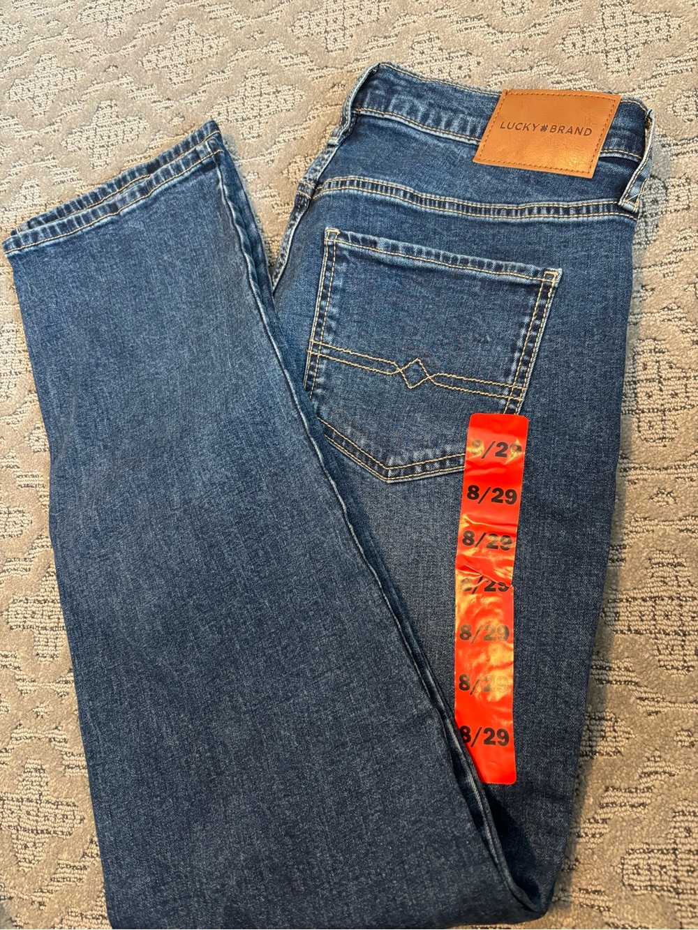 Lucky Brand Dark Blue Straight Jeans with Tan Leather Patch